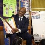 Superintendent Jones read a book to students in a classroom